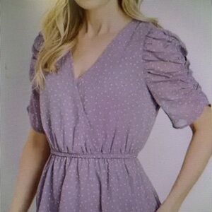 Dotted, puff sleeve peplum top.